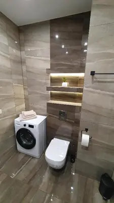 a bathroom with a toilet and a toliet at Apartament 20 Zator in Zator