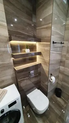 a bathroom with a toilet and a sink at Apartament 20 Zator in Zator