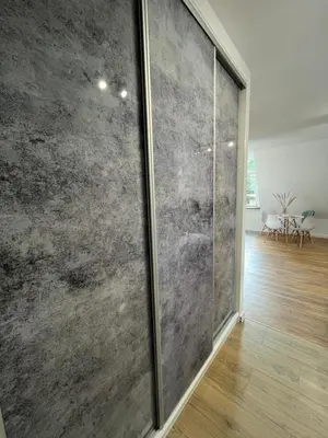 a room with a large glass door with a wooden floor at Apartament Willa Bellevue in Rabka