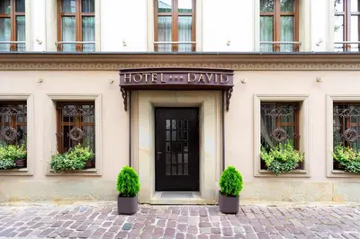 a hotel entrance with a sign that reads hotel the divide at David Boutique ApartHotel in Kraków