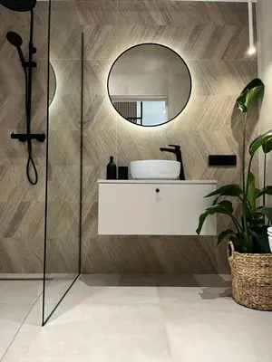 a bathroom with a sink and a mirror at Apartament 4 piętro in Zator