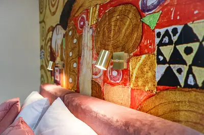 a close up of a painting on a wall at Main Square Platan Loft Collection in Kraków
