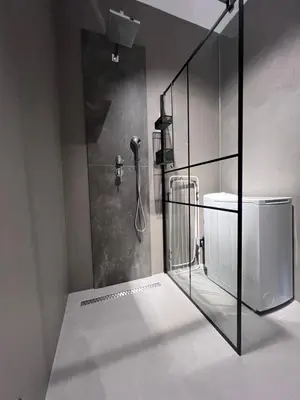 a bathroom with a shower with a phone on the wall at Prestige 12 in Zator