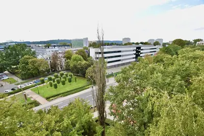 an aerial view of a building with trees and a street at Czarnowiejska Mini Studio in Kraków