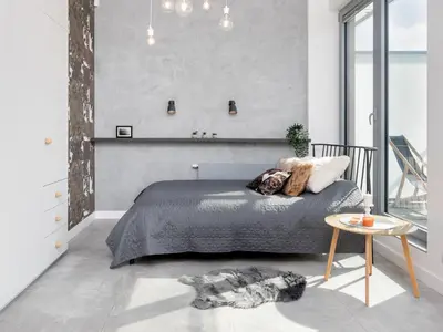 a living room with a couch and a table at Kraków Loft in Kraków