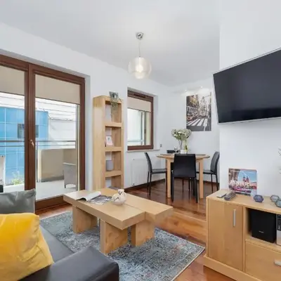 Kraków Błonia Apartment with Balcony by Noclegi Renters