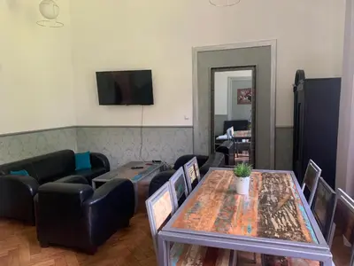 a living room with a couch and a table at Near the Royal Castle in Kraków