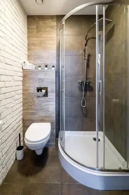 a bathroom with a shower and a toilet and a sink at Modern aparment in the very central location 19 in Kraków