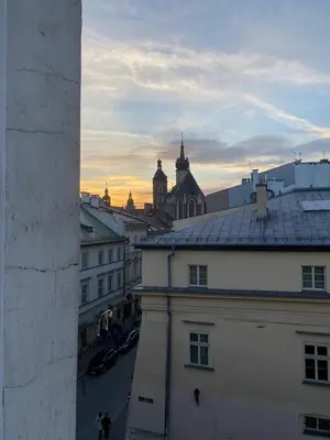 a view of a city from a building at LOTOS Hostel in Kraków