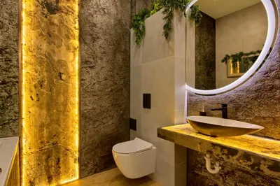 a bathroom with a sink and a toilet and a mirror at Silver Shine jacuzzi in Kraków