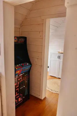 a room with a large video game at Chatki Osada Babia Raj Zawoja in Zawoja