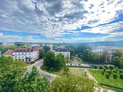 a view of a city with buildings and trees at Czarnowiejska Micro Studio in Kraków