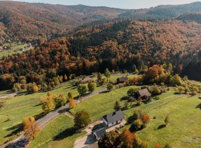 an aerial view of a house in a field at Beskidzka Oaza in Targanice