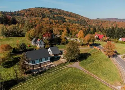 an aerial view of a home in the mountains at Beskidzka Oaza in Targanice