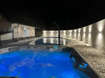 a jacuzzi tub in a building at night at Willa Sonia Zawoja in Zawoja