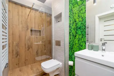 a bathroom with a toilet and a shower at Kraków Trendy Studio Apartments by Noclegi Renters in Kraków