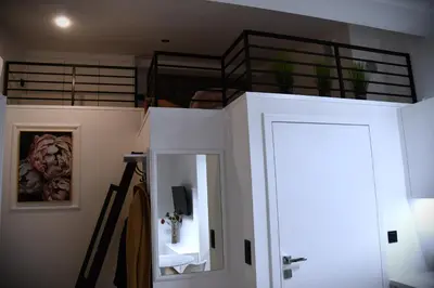 a room with a bunk bed and a mirror at M-Keys Apartments Kraków Old Town Kazimierz in Kraków
