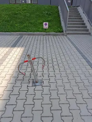 a metal object on the ground on a sidewalk at Sołtysowska Apartment in Kraków