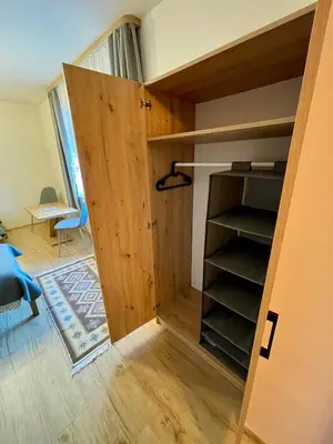 a door leading into a room with a closet at Przyszowa 441 in Przyszowa