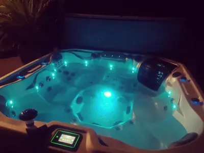 a jacuzzi tub with lights in a room at Słodki Zakątek Spa Jacuzzi&Sauna in Sobolów