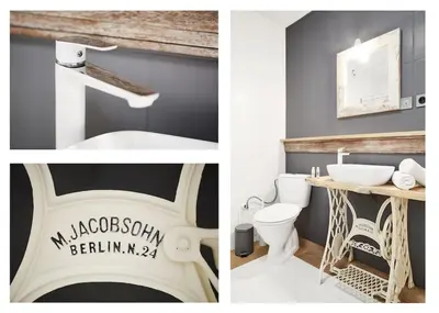 a bathroom with a sink and a toilet and a mirror at HOUSEHOST Apartment: Józefa Dietla 73/7 in Kraków