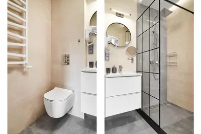 a bathroom with a toilet and a shower at HOUSEHOST Apartament :Miodowa 42/4b in Kraków