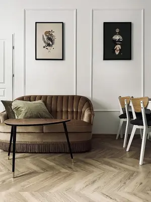 a living room with a couch and a table at Monkeyland - unique apartment in Old Podgorze in Kraków