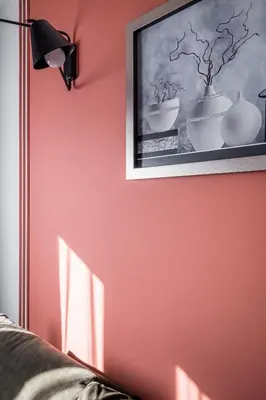a room with a wooden door and a painting on the wall at Radziwillowska Old Town Deluxe Apartment WAWELOFTS in Kraków