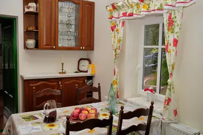 a kitchen with a table with fruit on it at Morowo chałupa in Czchów