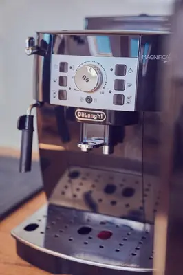 a coffee machine sitting on top of a table at WieliczkaHome 1st floor + garden + parking in Wieliczka