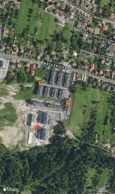 a map of a building with a red circle on it at Apartament in Bochnia