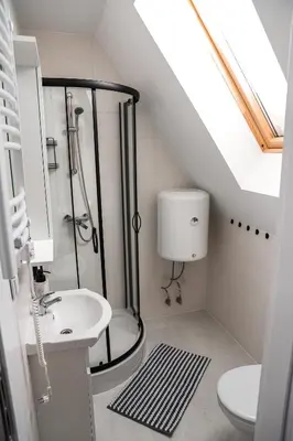 a bathroom with a shower and a sink at Agroturystyka Yvonne in Zawoja