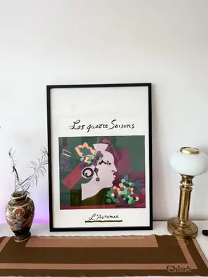 a framed picture of a woman on a table at Designer Loft 60m sq in Cracow Center Sunny Top-Floor Apartment with Balcony, King Bed & Great Transport in Kraków