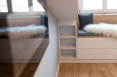 a room with a shelf with faux fur at Wawel View Apartment in Kraków
