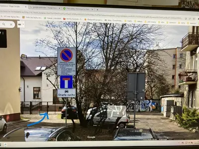 a view of a street sign on a computer screen at NEO SKY Apartment, FREE PARKING, 15 min walk Old Town&Kazimierz - by Homelike Krakow in Kraków