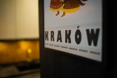a sign that says krako w on a wall at Krakow Centrum Sunny Apartment Lwowska 10 in Kraków