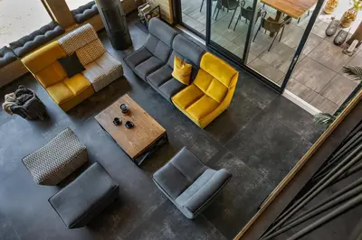 an overhead view of a living room with yellow furniture at Chillout Ślemień nowoczesny dom w górach in Ślemień