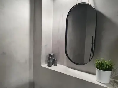 a bathroom sink with a mirror and a plant on a shelf at Fly_to_Cracow_14 in Kraków