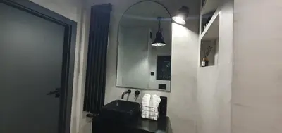 a bathroom with a sink and a mirror at Fly_to_Cracow_14 in Kraków