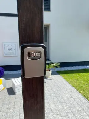 a parking meter on the side of a wooden pole at Beskid Family&Chill in Tenczyn