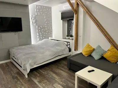 a bathroom with a sink and a mirror at Apartament Bronowice in Kraków
