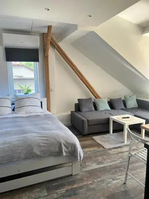 a bathroom with a sink and a toilet in it at Apartament Bronowice in Kraków