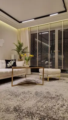 a living room with a couch and a table at Apartament Bulwary Oświęcim in Oświęcim