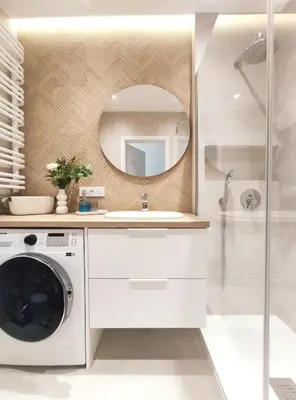 a bathroom with a washing machine and a mirror at Mogilska 120D by Homeprime in Kraków