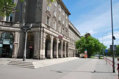 a large building on the side of a street at THE SOUL of Nowa Huta - free garage in Kraków