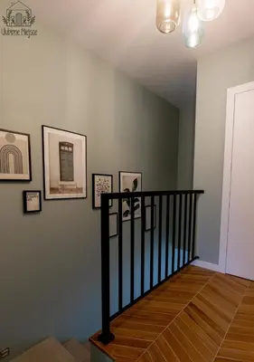 a room with a staircase with pictures on the wall at ULUBIONE MIEJSCE ZATOR in Zator
