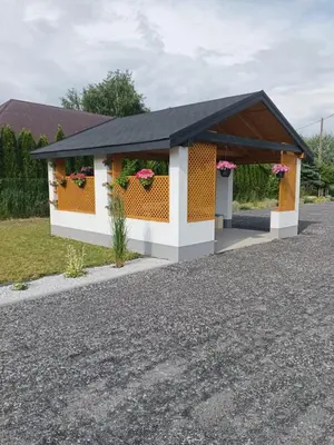 a rendering of a building with flowers on it at Domki - Apartamenty Complex in Zator