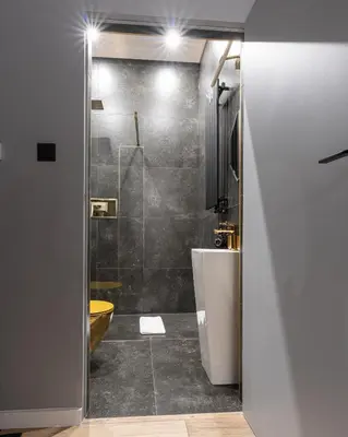 a bathroom with a shower and a toilet and a sink at Apartament z Jacuzzi Kraków SHINE Starowiślna in Kraków