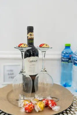 two wine glasses sitting on top of a table at Apartament z Jacuzzi Kraków SHINE Starowiślna in Kraków