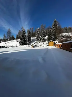 a pile of snow in front of a building at ObidovaGorce in Obidowa
